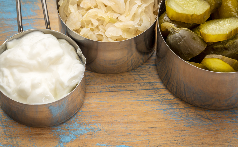 Yogurt, sauerkraut and pickled gherkins