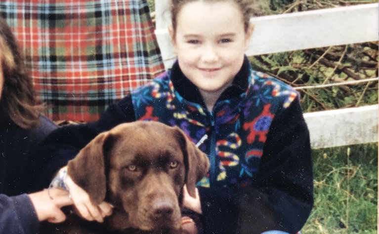 Clemmie with a dog during a period of taking steroids